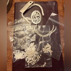 Shades of white varying shape beads